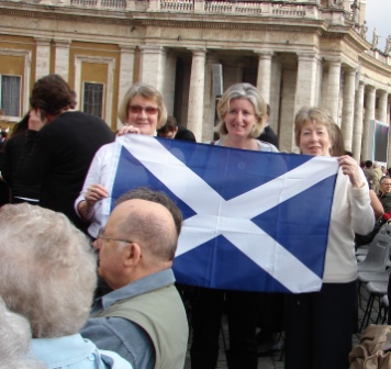 Ann and Sadie fly the flag with Gill, our guide.